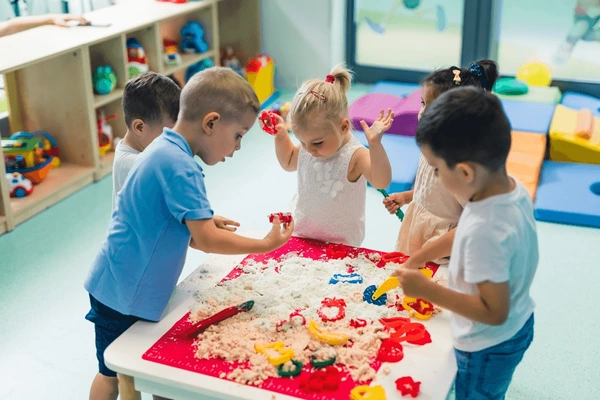 Toddler playing in a nursery classroom in Dubai